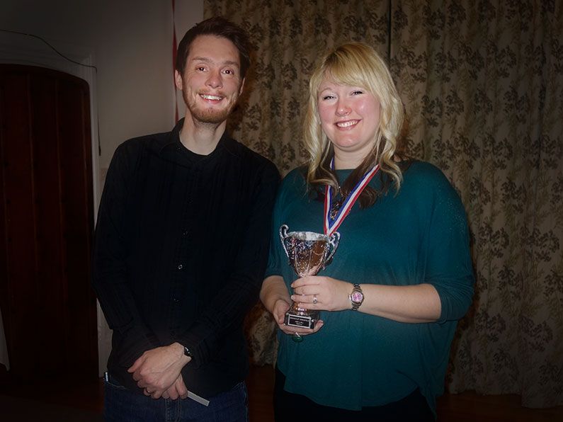 Ian and Charlotte receiving their award from the Bowmen of Danesfield