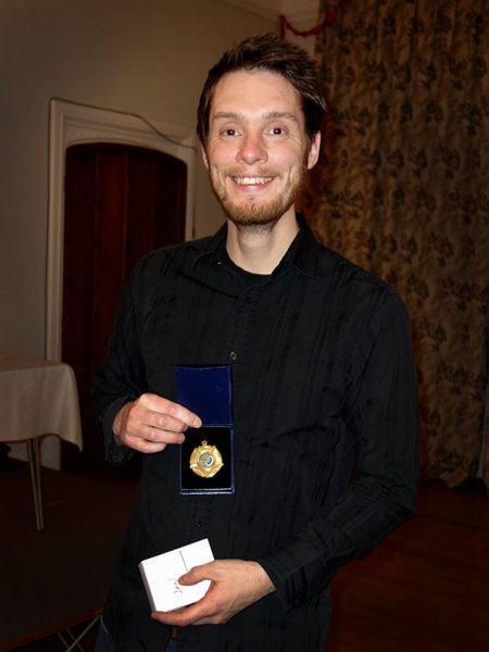 Ian receiving his award from the Bowmen of Danesfield