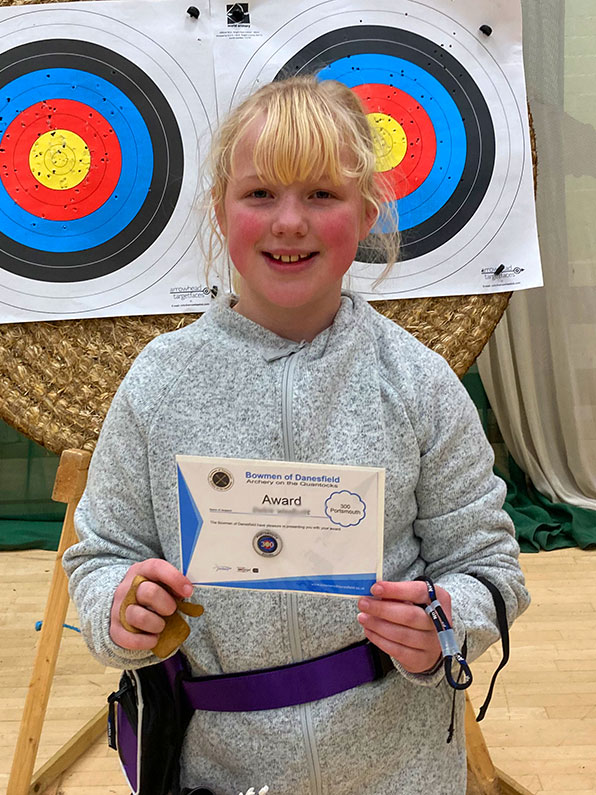 Dulcie with Certificate for achieving 300 on a Portsmouth Round