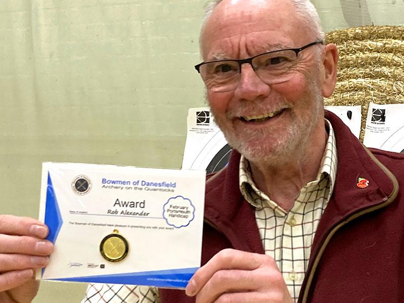 Rob with his award for the February Portsmouth Handicap Competition Somerset