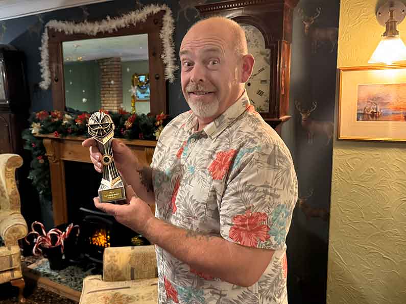 Christmas Meal and Awards 2025 Philip Churchill with his award for Top Record Breaker Barebow Christmas Meal and Awards 2025 Philip Churchill with his award for Top Record Breaker Barebow