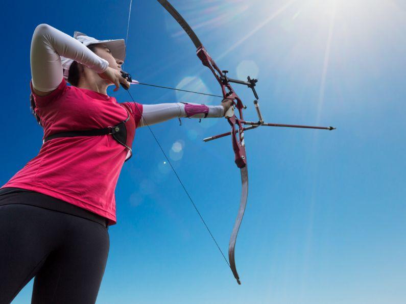 Female Archer with Recurve Bow